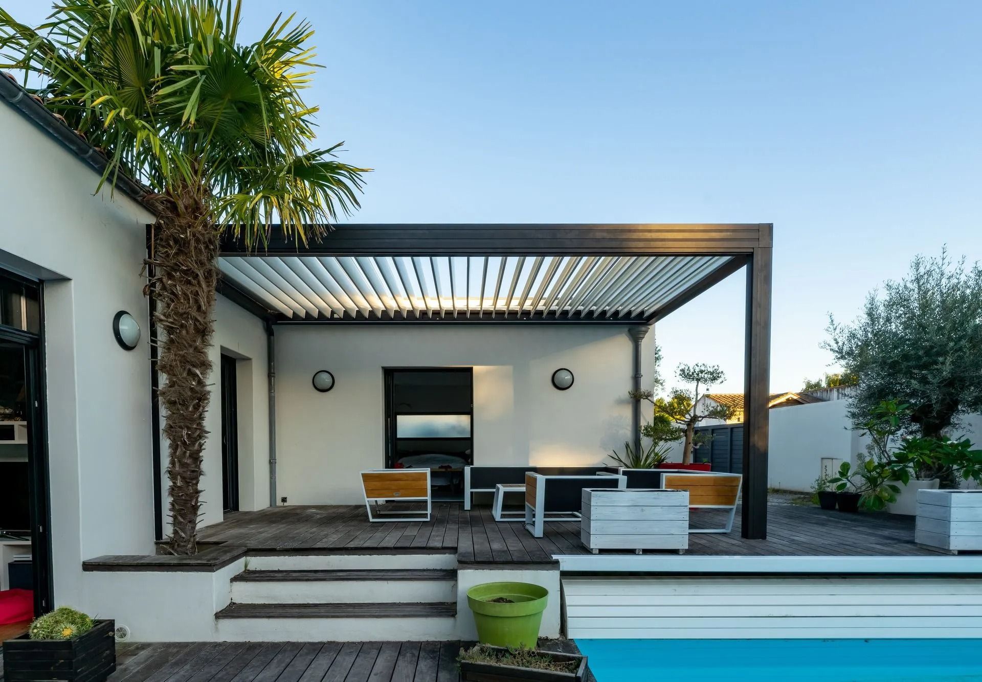 Apollo Opening Roof system with adjustable louvres over an outdoor living space