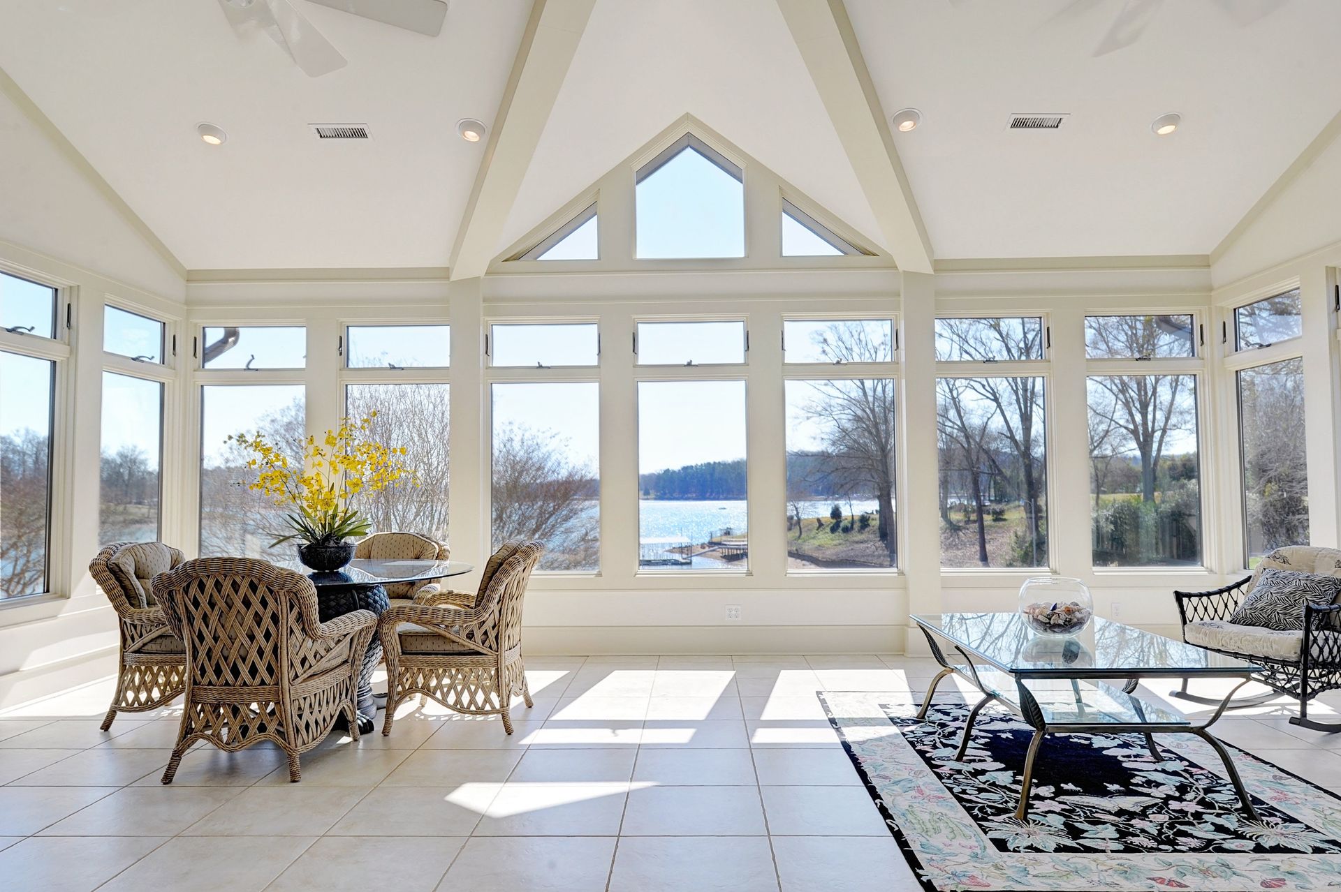 Bright custom sunroom addition with energy-efficient windows