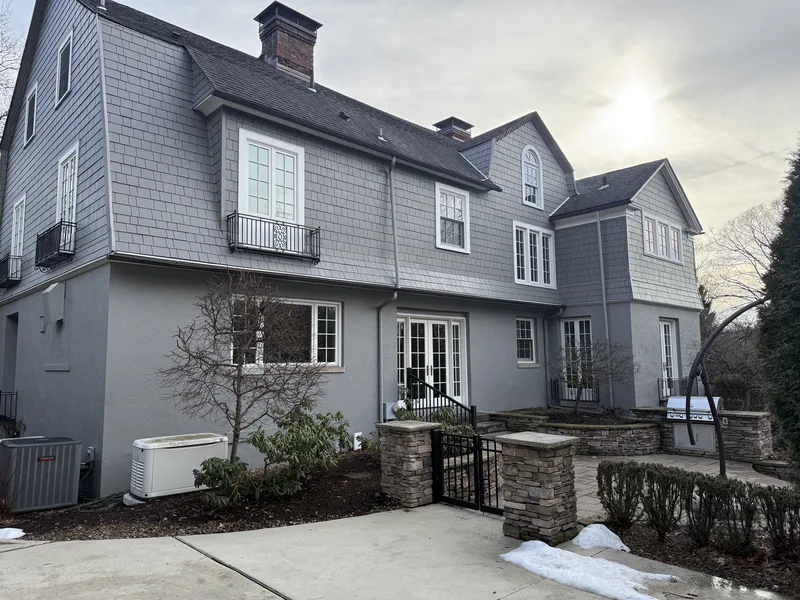 Rear elevation with dormers and balconies, finished in James Hardie shingle siding