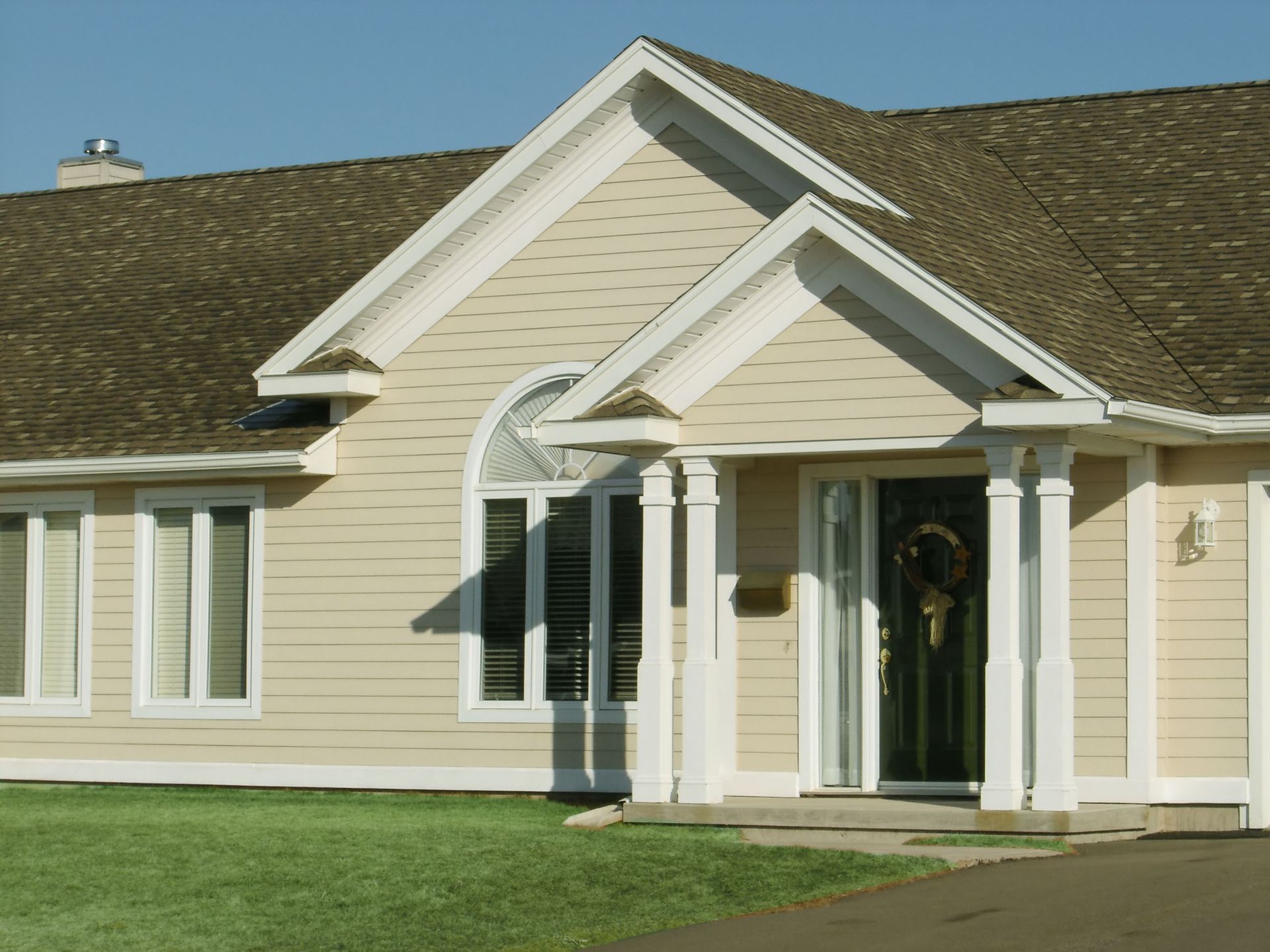 A Reliable Exteriors crew working on a Western Pennsylvania home exterior